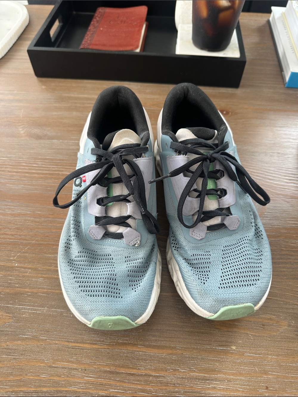 On Running Light Blue and Black Cloud Sneakers